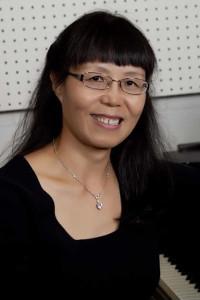 headshot of Dr. Huang-Davie